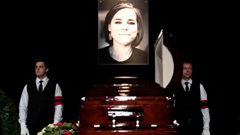 A portrait of Russian Daria Dugina, who was killed in a car bomb explosion the previous week, is displayed near her coffin during a farewell ceremony at the Ostankino TV centre in Moscow on August 23, 2022.