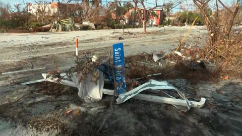 Julie Emig and Vicki Paskaly saw this mangled sign on Sanibel Island as the couple returned to check on their home.