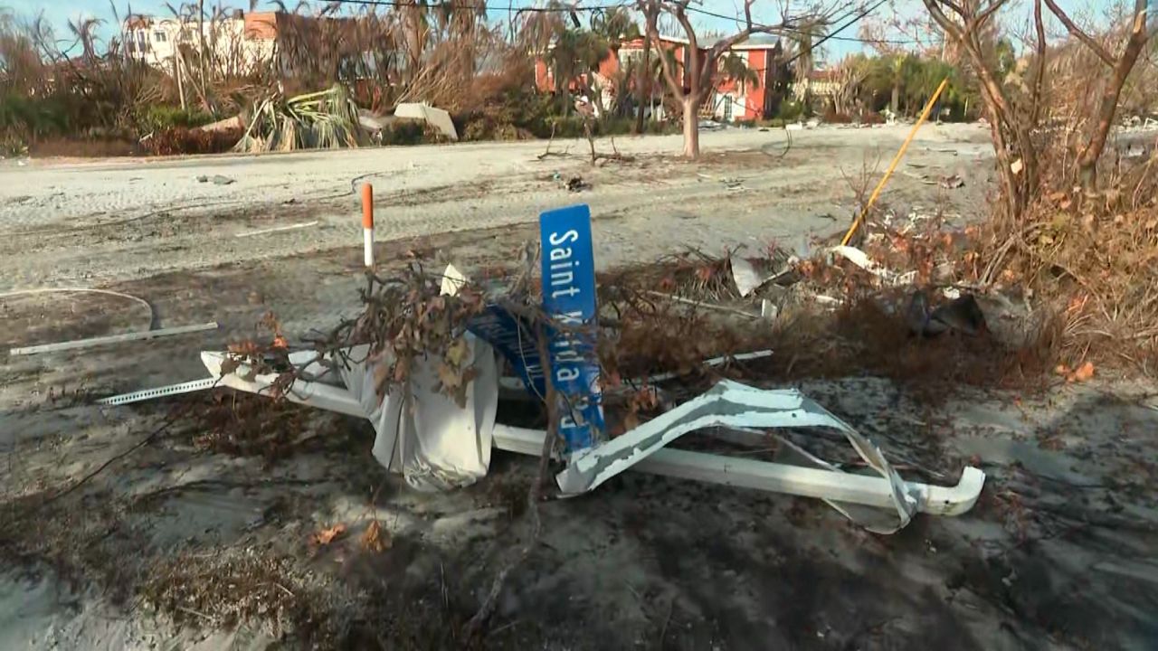 Julie Emig and Vicki Paskaly saw this mangled sign on Sanibel Island as the couple returned to check on their home. 