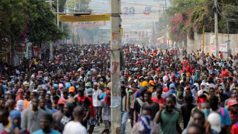 People march during a protest against the government and rising fuel prices, in Port-au-Prince, Haiti October 3, 2022.