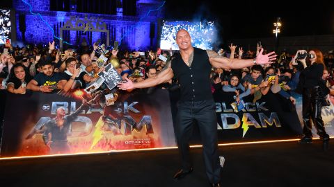 Dwayne Johnson poses during the black carpet for the 