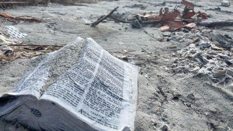 A bible covered in mud was found on the side of the road off West Gulf Drive, in Sanibel.