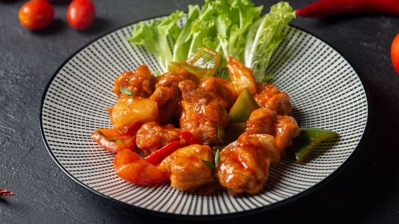 <strong>Sweet and sour pork: </strong>Deep-fried pork can feel a bit heavy, especially in unforgiving summer weather. Thankfully, we have sweet and sour pork. The pineapple and sauce -- made with sugar, vinegar and soy sauce -- adds some freshness to the crispy pork.