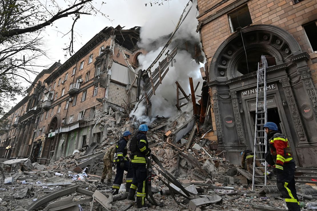 Rescuers work at a site of a residential building heavily damaged by a Russian strike in Zaporizhzhia city on Thursday.