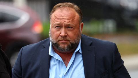 Infowars founder Alex Jones prepares to speak to the media on October 4.