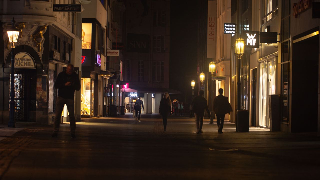 Dimmed lights are seen in the city center of Bonn, Germany, on September 11, 2022 as city administration announce saving energy measures to cutting gas and electricity for the autumn and winter to cope with energy crisis in Germany.