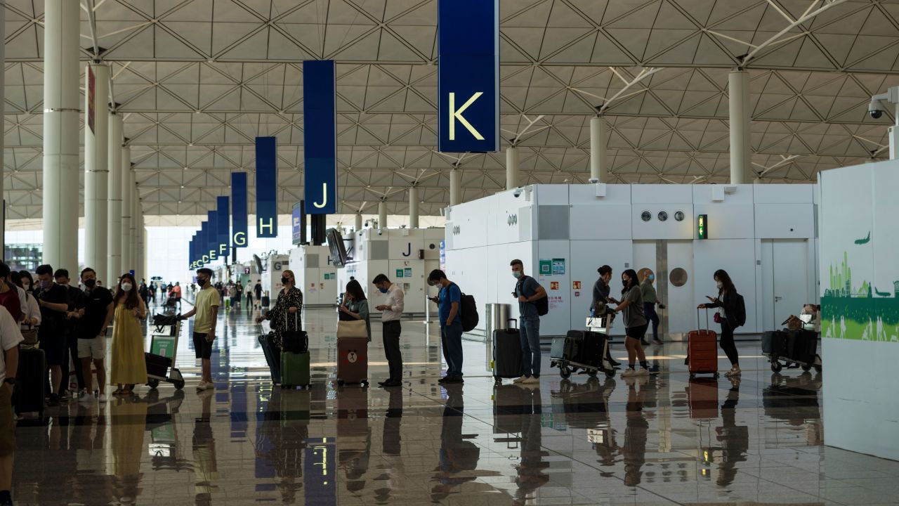 Travelers in the departure hall of Hong Kong International Airport on September 26.