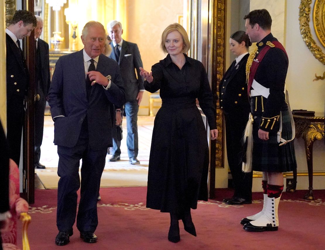 The King walks with Prime Minister Liz Truss and members of her Cabinet in the 1844 Room, at Buckingham Palace on September 10. 