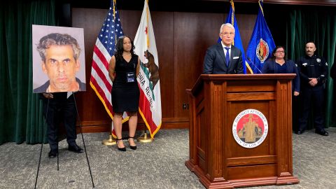 Los Angeles District Attorney George Gascon announces sexual assault charges against TV producer Eric Weinberg, seen in a displayed photograph on the far left, on Wednesday in Los Angeles. 