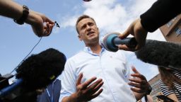Russian opposition leader Alexei Navalny speaks with journalists during a rally to support opposition and independent candidates after authorities refused to register them for September elections to the Moscow City Duma, Moscow, July 20, 2019. (Photo by Maxim ZMEYEV / AFP) (Photo by MAXIM ZMEYEV/AFP via Getty Images)