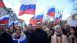 Russian opposition leader Alexei Navalny, his wife Yulia, opposition politician Lyubov Sobol and other demonstrators march in memory of murdered Kremlin critic Boris Nemtsov in downtown Moscow on February 29, 2020. (Photo by Kirill KUDRYAVTSEV / AFP) (Photo by KIRILL KUDRYAVTSEV/AFP via Getty Images)