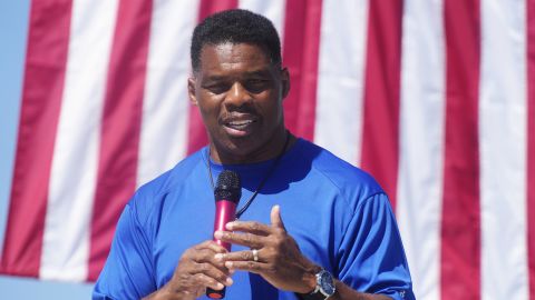 Herschel Walker, the GOP Senate nominee in Georgia, smiles during remarks at a campaign stop in Wadley on October 6, 2022.