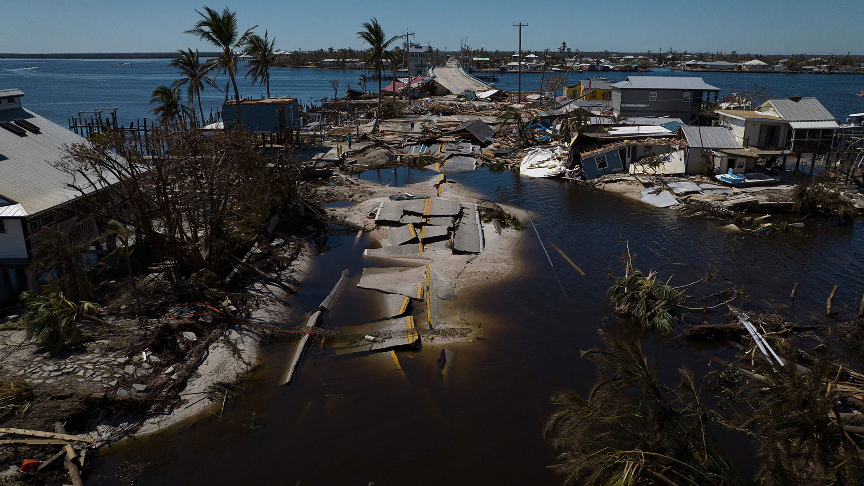 A broken section of road and destroyed houses are seen in the aftermath of <a href="https://www.cnn.com/2022/09/26/weather/gallery/hurricane-ian/index.html" target="_blank">Hurricane Ian</a> in Matlacha, Florida, on Saturday, October 1.