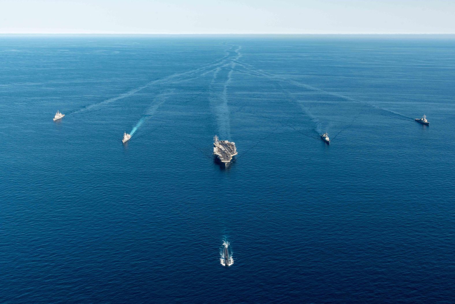 The USS Annapolis submarine, front; the US aircraft carrier Ronald Reagan, center; and South Korean and Japanese warships are seen during a combined trilateral anti-submarine exercise off the coast of the Korean Peninsula on Friday, September 30. US Secretary of State Antony Blinken warned that if North Korea continues "down this road" of provocation following its <a href="https://www.cnn.com/2022/10/04/asia/north-korea-missile-japan-explainer-intl-hnk" target="_blank">ballistic missile launch</a> over Japan on Tuesday, "it will only increase the condemnation, increase the isolation and increase the steps that are taken in response to their actions."
