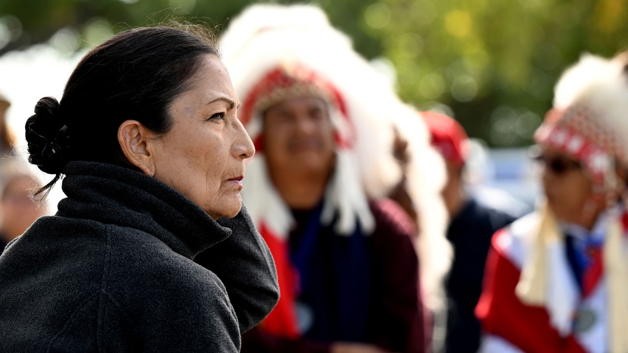 Secretary of the Interior Deb Haaland, who is a member of the Pueblo of Laguna tribe and the first Native American to serve as a cabinet secretary, listens during a gathering at the Sand Creek Massacre National Historic site on Wednesday at the Sand Creek Massacre National Historic Site near Eads, Colo.  