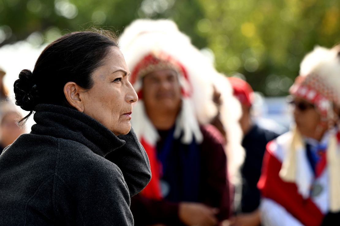 Secretary of the Interior Deb Haaland, who is a member of the Pueblo of Laguna tribe and the first Native American to serve as a cabinet secretary, listens during a gathering at the Sand Creek Massacre National Historic site on Wednesday at the Sand Creek Massacre National Historic Site near Eads, Colo.  