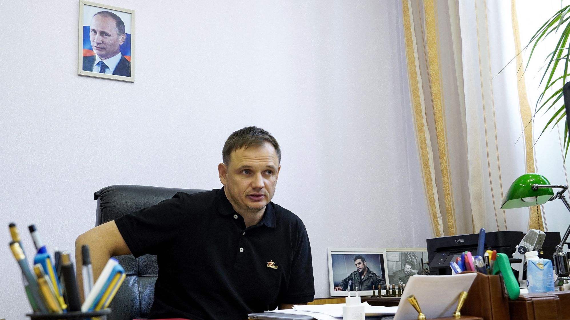 Kirill Stremousov is pictured in his office, with a portrait of Russian President Vladimir Putin seen on the wall behind him, in the city of Kherson on July 20.