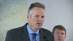 Gov. Mike Dunleavy speaks about the detained Russians on October 5, 2022.