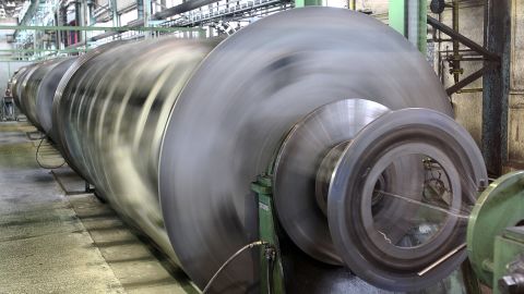 Cable drums turn on the conductor and cabling machine at Prysmian cable factory in Schwerin, Germany, in April 2010. 