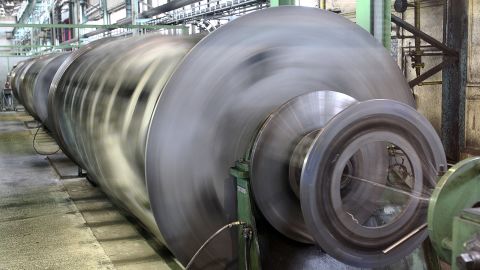 Cable drums inspect the control and cable machine at Prysmian Cable Factory in Schwerin, Germany, April 2010.