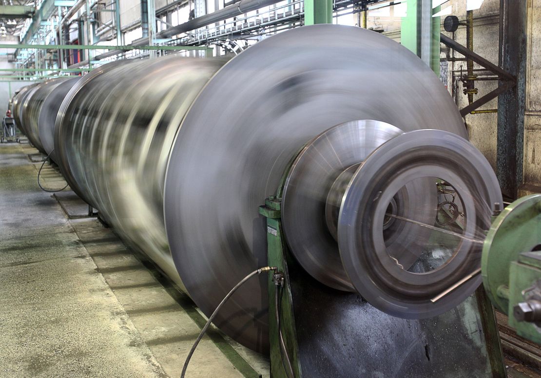 Cable drums turn on the conductor and cabling machine at Prysmian cable factory in Schwerin, Germany, in April 2010. 
