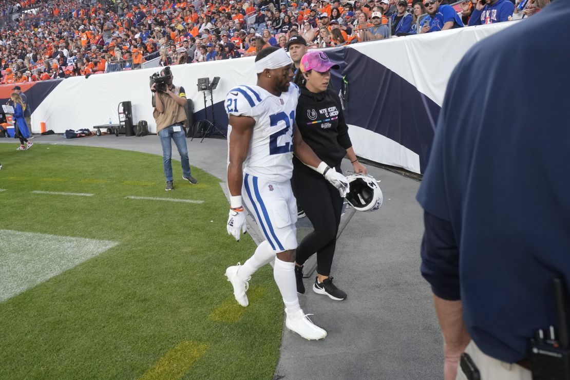 Indianapolis Colts running back Nyheim Hines leaves the field after an injury during the first half of an NFL football game against the Denver Broncos, Thursday, October 6, 2022, in Denver. 