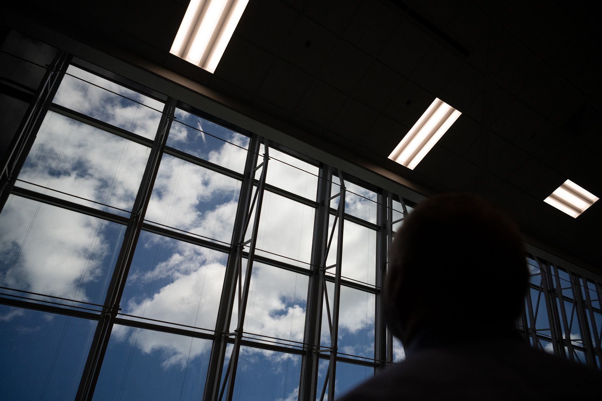 People watch the rocket take off from inside the launch control center at NASA's Kennedy Space Center.