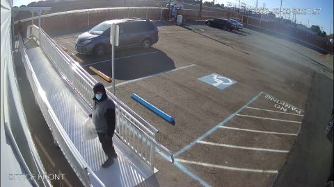 Suspect prepares to enter the family's business in Merced, California. 