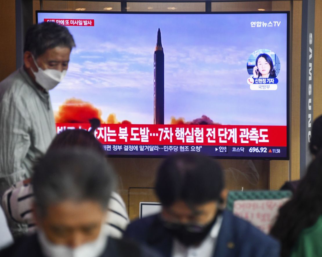 A television screen at Seoul Station in South Korea shows news of North Korea firing ballistic missiles on October 6. 