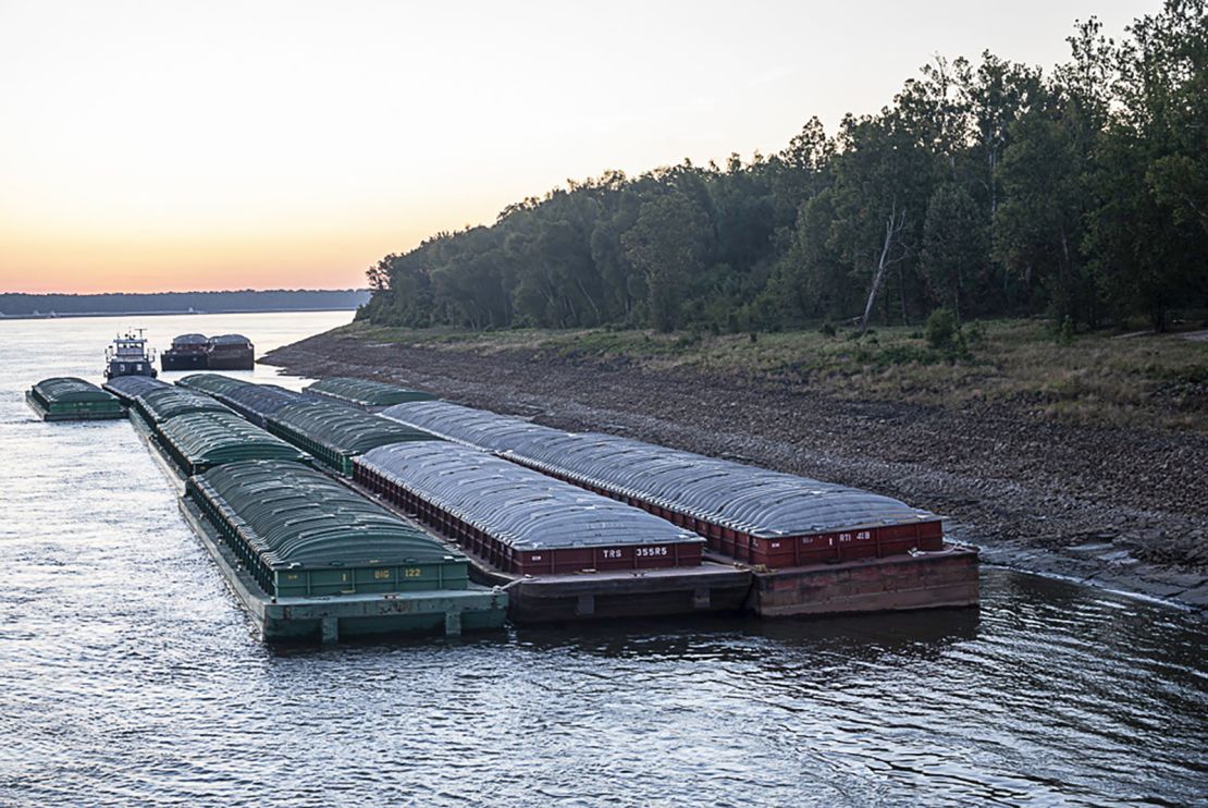 Barges idle while waiting for passage in the Mississippi River near Vicksburg, Miss., on Tuesday.