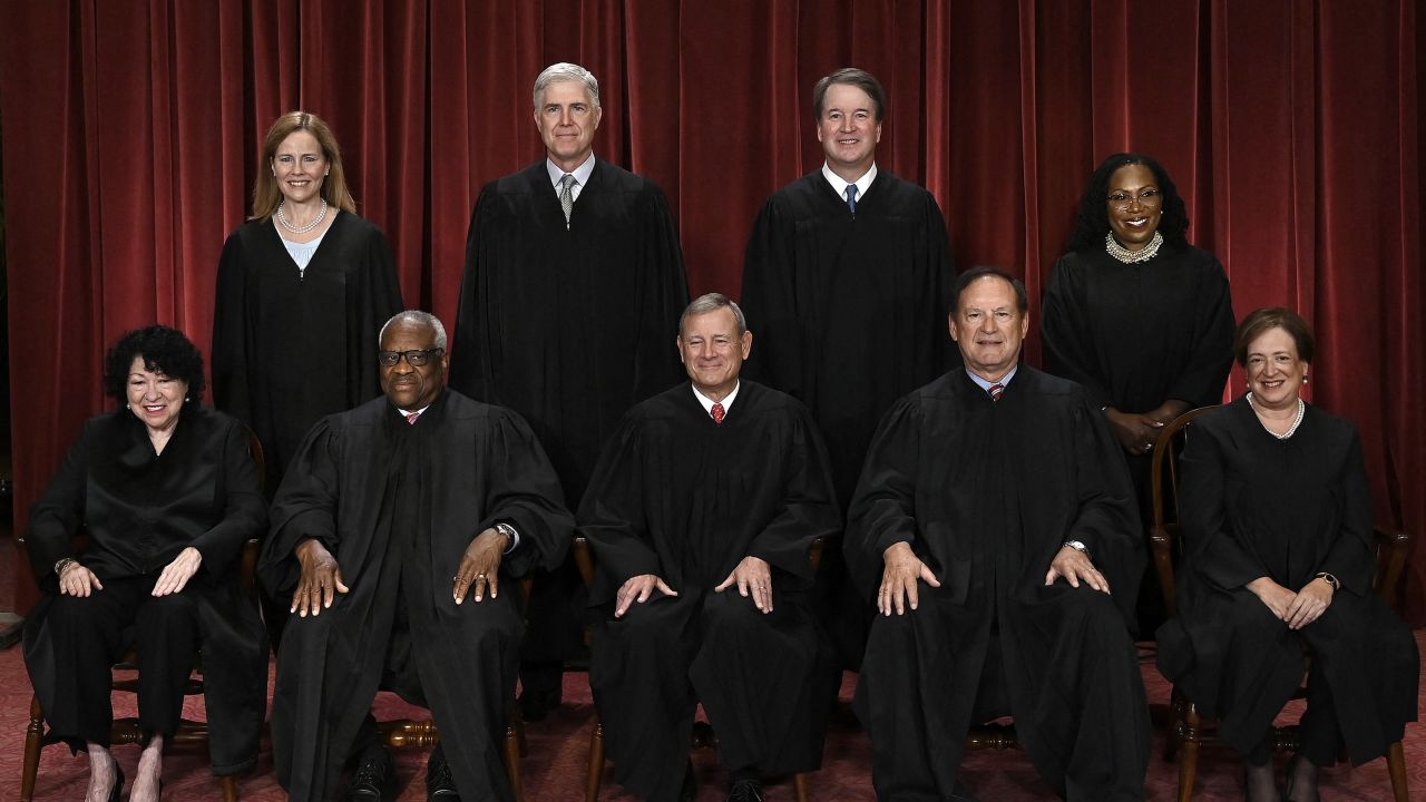 Justices of the US Supreme Court pose for their official photo at the Supreme Court in Washington, DC on October 7, 2022.