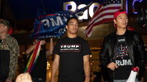 Christian Walker, center, attends a march in support of President Donald Trump in Los Angeles on October 23, 2020. 