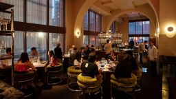 FILE -- Patrons dine at Al Coro, one of the newcomers in the 2022 Michelin Guide New York City, in New York, June 18, 2022. The star ratings will not be revealed until October, but the Michelin Guide has offered a glimpse of the new restaurants making the list. (Karsten Moran/The New York Times)