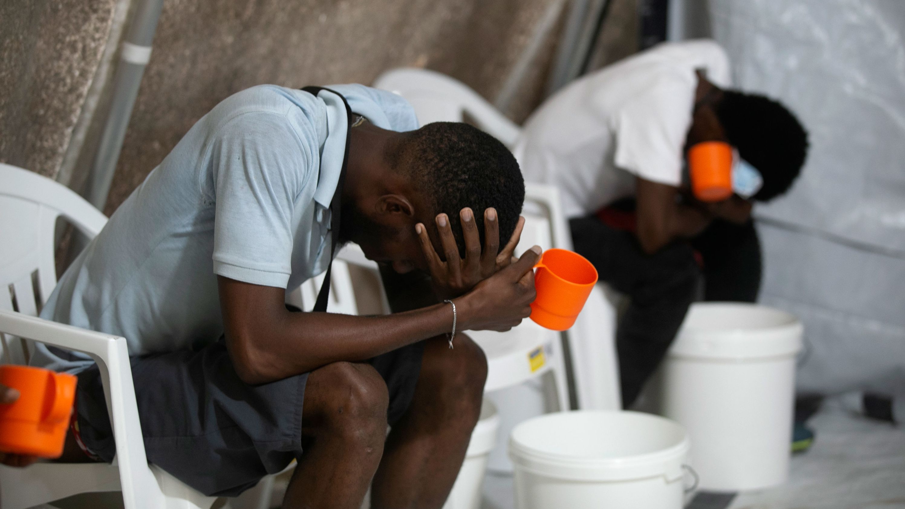 People suffering symptoms of cholera pictured on October 7.