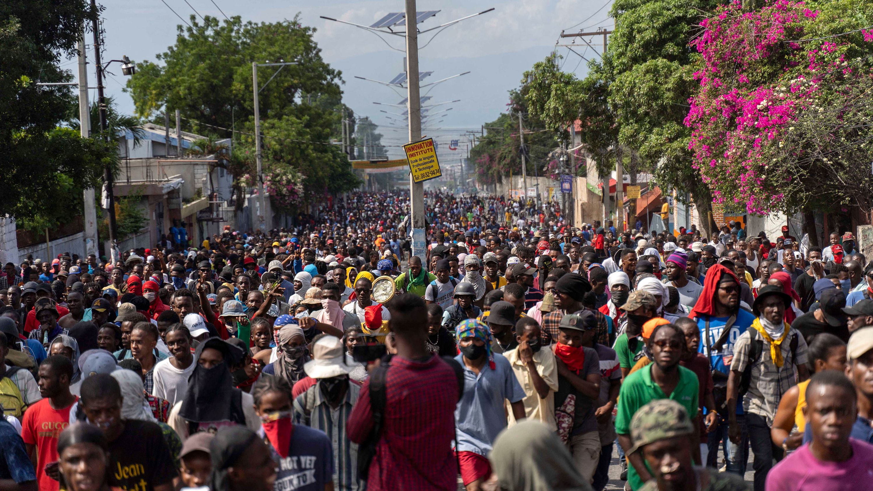 Demonstrators fill the streets during a protest to demand the resignation of Prime Minister Ariel Henry, in the Petion-Ville area of Port-au-Prince, Haiti, October 3, 2022. 