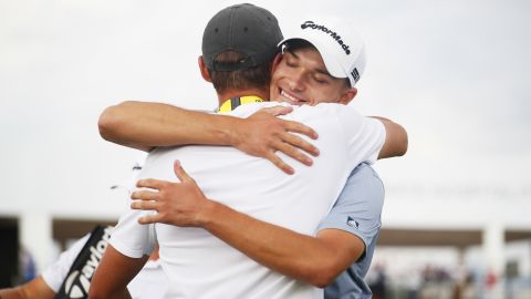 The brothers embrace after Nicolai's Italian Open triumph.