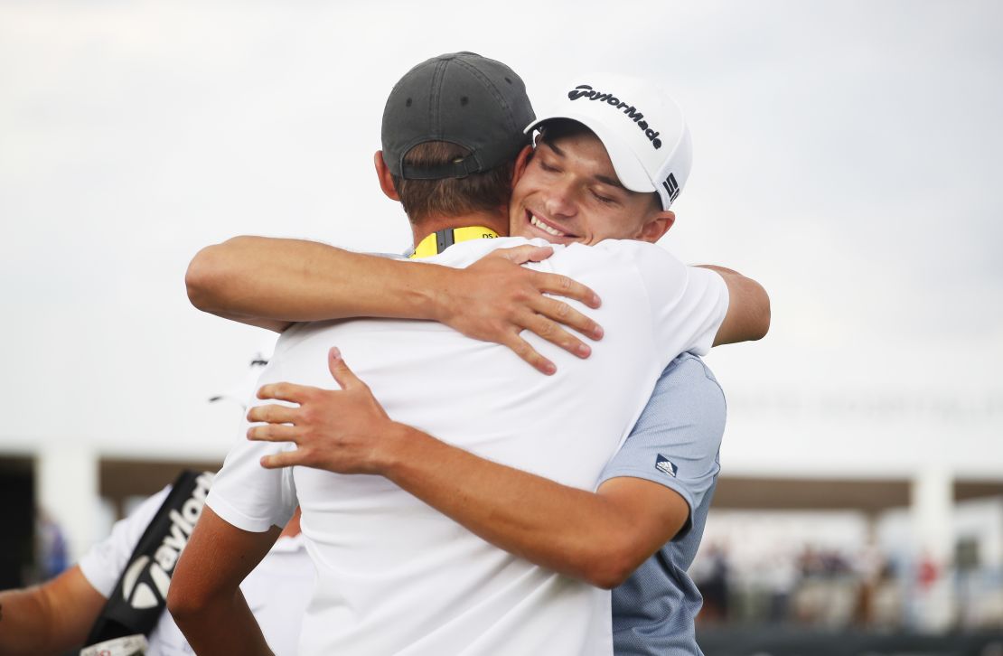 The brothers embrace after Nicolai's Italian Open triumph.