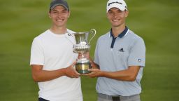 ROME, ITALY - SEPTEMBER 05: Nicolai Hojgaard of Denmark poses for a photo with his brother Ramus Hojgaard of Denmark and the trophy during Day Four of The Italian Open at Marco Simone Golf Club on September 05, 2021 in Rome, Italy. (Photo by Luke Walker/Getty Images)