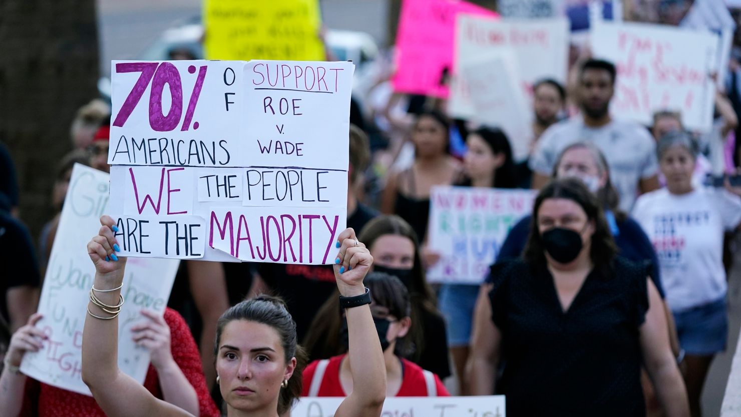 Protesters march around the Arizona Capitol in Phoenix after the Supreme Court decision to overturn Roe v. Wade, Friday, June 24, 2022.