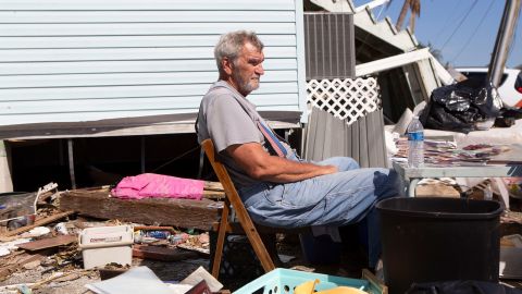 Charlie Whitehead has spent days trying to salvage family photos that were nearly destroyed by the flood. 