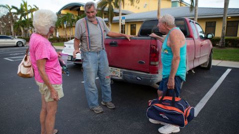 Pat and Les share a moment with Charlie to say goodbye as he drops them off at a shelter Wednesday night.