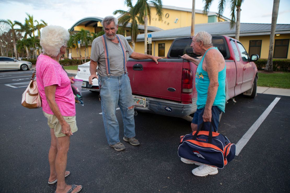 Pat and Les share a moment with Charlie to say goodbye as he drops them off at a shelter Wednesday night.