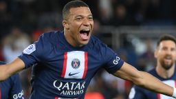 Paris Saint-Germain's French forward Kylian Mbappe (C) celebrates  after scoring a goal during the French L1 football match between Paris Saint-Germain (PSG) and OGC Nice at The Parc des Princes Stadium in Paris on October 1, 2022. (Photo by FRANCK FIFE / AFP) (Photo by FRANCK FIFE/AFP via Getty Images)