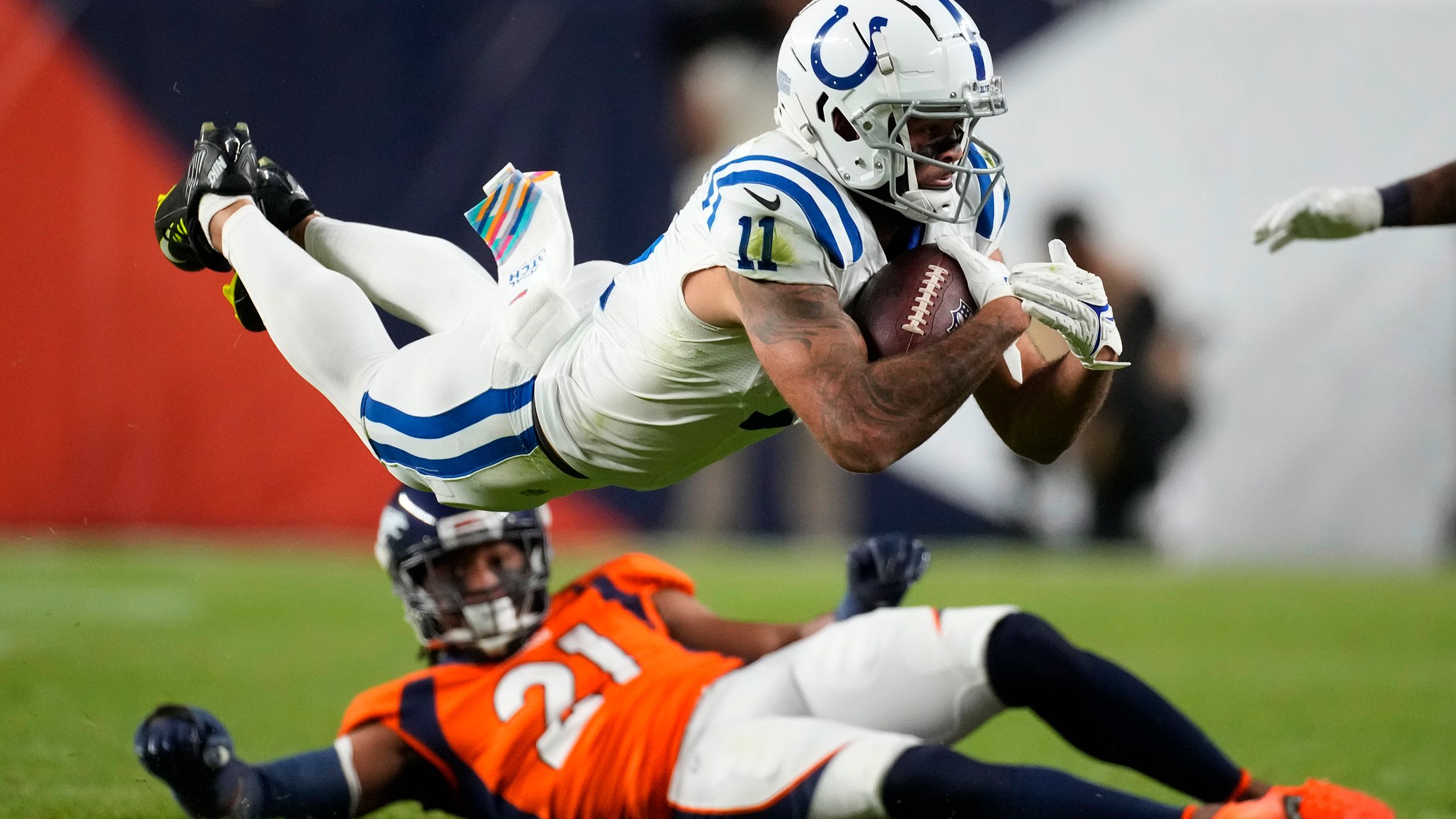 Indianapolis Colts wide receiver Michael Pittman Jr. is tripped up by Denver Broncos cornerback K'Waun Williams. It was a rare glimpse of offense in a <a href="index.php?page=&url=https%3A%2F%2Fwww.cnn.com%2F2022%2F10%2F07%2Fsport%2Fdenver-broncos-indianapolis-colts-tnf-nfl-spt-intl%2Findex.html" target="_blank">lackluster 12-9</a> win for the Colts.