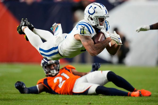 Indianapolis Colts wide receiver Michael Pittman Jr. is tripped up by Denver Broncos cornerback K'Waun Williams. It was a rare glimpse of offense in a <a href="index.php?page=&url=https%3A%2F%2Fwww.cnn.com%2F2022%2F10%2F07%2Fsport%2Fdenver-broncos-indianapolis-colts-tnf-nfl-spt-intl%2Findex.html" target="_blank">lackluster 12-9</a> win for the Colts.