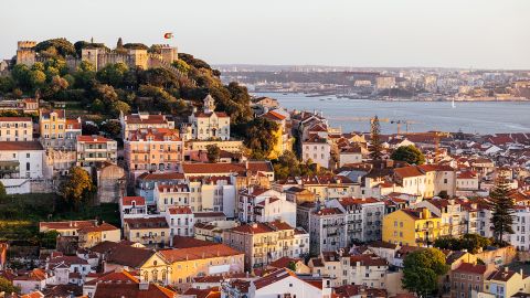Lisbon cityscape with St. George Castle (Castelo de São Jorge) at sunset, Portugal - stock photo