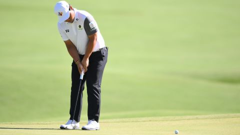 Kim putts on the ninth green during the final round.