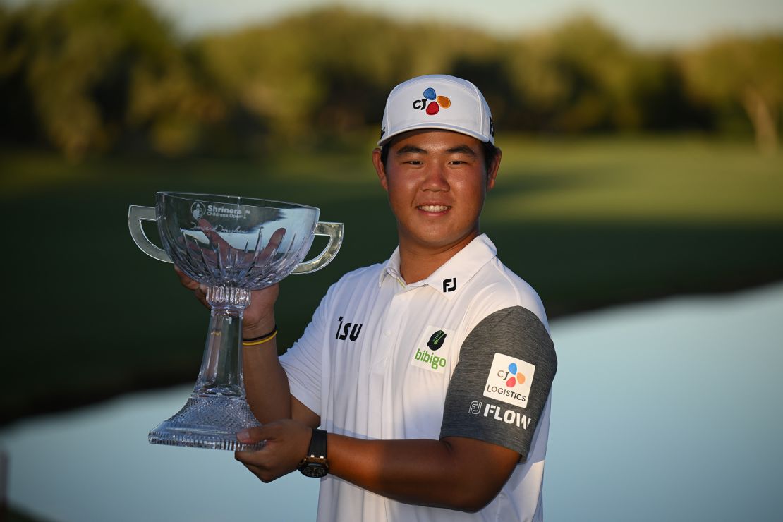 Kim poses with the Shriners Children's Open trophy.