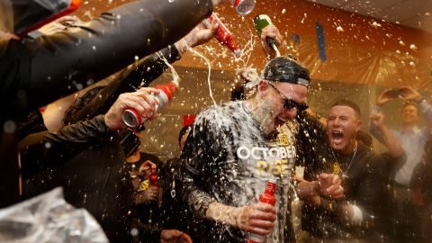 Musgrove is doused in champagne after Sunday's game.