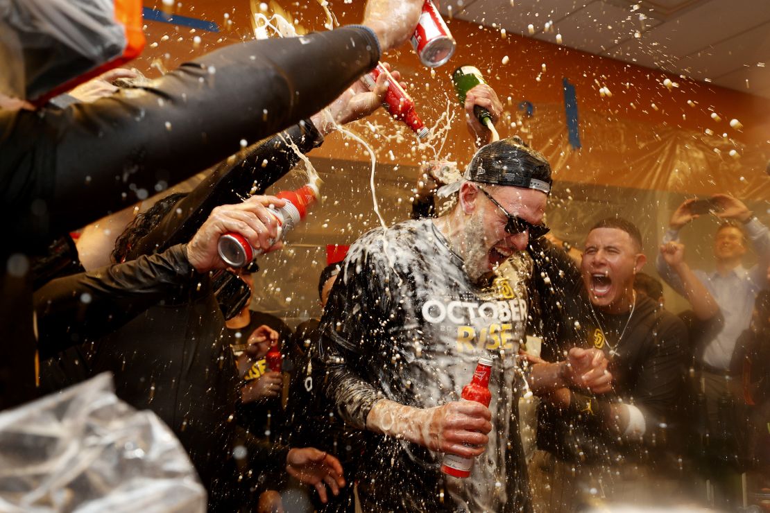 Musgrove is doused in champagne after Sunday's game. 